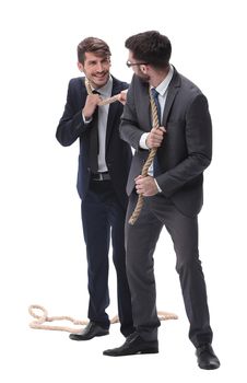 full length . two businessmen pulling a long rope. isolated on white background.