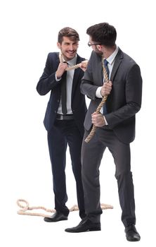 full length . two businessmen pulling a long rope. isolated on white background.