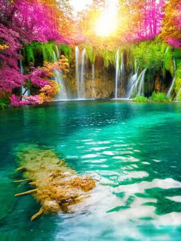 Exotic waterfall and lake landscape of Plitvice Lakes National Park, UNESCO natural world heritage and famous travel destination of Croatia. The lakes are located in central Croatia (Croatia proper).