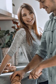 modern young couple enjoys cooking Breakfast together.