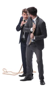 full length . two businessmen pulling a long rope. isolated on white background.