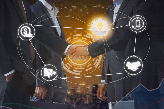 Ethereum ETH and cryptocurrency payment acceptance concept - Businessman handshaking showing accepted payment by using Ethereum coin. Blockchain and financial technology.