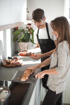 close up.young husband and wife cook Breakfast together