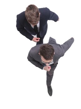 top view. two business people stepping forward. isolated on white background