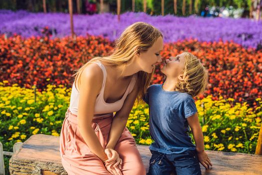 Mum and the son of a flower greenhouse.