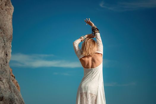 fashionable young model in boho style dress