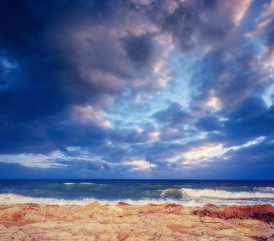 Fantastic view of the nature reserve Monte Cofano. Dramatic scene. Sunset over sea. Location cape San Vito. Sicilia, Italy, Europe. Mediterranean and Tyrrhenian sea.