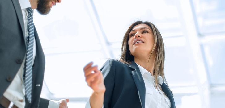 business couple on the background of a modern office.photo with copy space