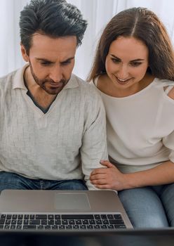 close up.a couple watches their favorite show . photo with copy space