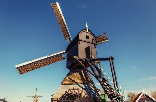 Traditional Dutch windmills from the channel Rotterdam. Holland.