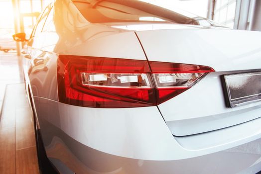 The headlights and the hood of a sports car