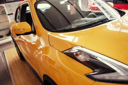 Headlights and hood of sport car. Exhibition