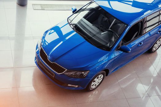 The headlights and the hood of a sports car.