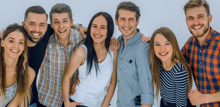 portrait of a cheerful group of young people.isolated on light background