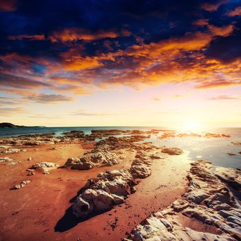 Fantastic view of the nature reserve Monte Cofano. Dramatic scene. Sunset over sea. Location cape San Vito. Sicilia, Italy, Europe. Mediterranean and Tyrrhenian sea.