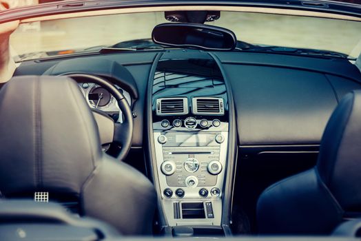 The luxurious cabin interior black modern car