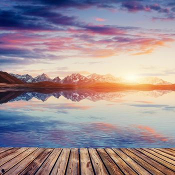 Sunset on mountain lake Koruldi. Upper Svaneti, Georgia, Europe. Caucasus mountains