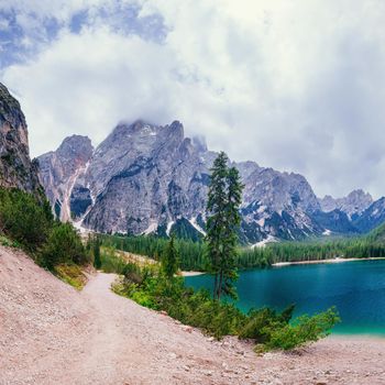 Mountain lake between by mountains. Seaside villa Italy