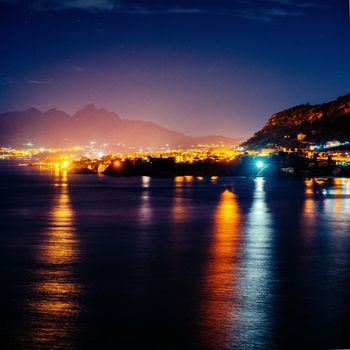 city with a night on the beach. Sicily. Italy Europe