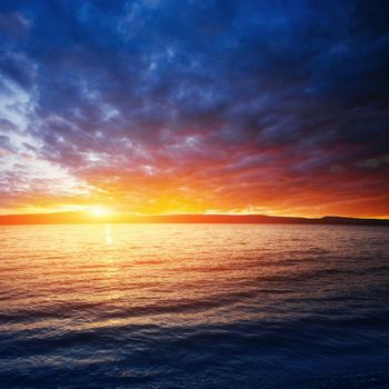 Fantastic view of the nature reserve Monte Cofano. Dramatic scene. Sunset over sea. Location cape San Vito. Sicilia, Italy, Europe. Mediterranean and Tyrrhenian sea.