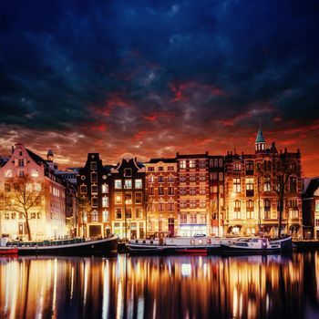 Amsterdam canal on the west. Amsterdam is the capital and most densely populated city in the Netherlands.