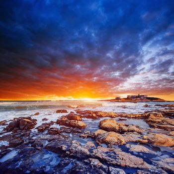 Fantastic view of the nature reserve Monte Cofano. Dramatic scene. Sunset over sea. Location cape San Vito. Sicilia, Italy, Europe. Mediterranean and Tyrrhenian sea.