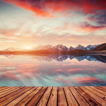 Sunset on mountain lake Koruldi. Upper Svaneti, Georgia, Europe. Caucasus mountains