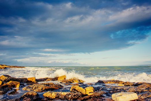 Fantastic view of the nature reserve Monte Cofano. Dramatic scene. Sunset over sea. Location cape San Vito. Sicilia, Italy, Europe. Mediterranean and Tyrrhenian sea.