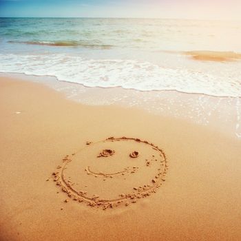 drawings in the sand on the beach.