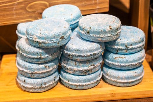 Colorful beautiful handmade aromatic soap on the shop window.