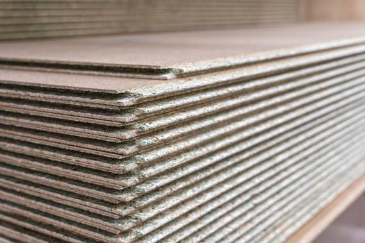 Oriented chipboard OSB. Tongue-and-groove moisture-resistant chipboard impregnated with a protective composition. spike-groove, groove-comb