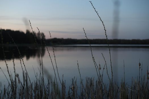 Nature landscape. Reflection, blue sky and yellow sunlight. landscape during sunset.