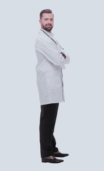 in full growth. smiling medical specialist inviting you.isolated on white background