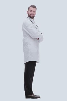 side view. smiling medical doctor looking at copy space .isolated on white background