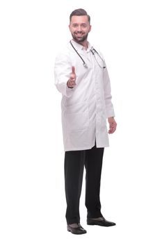 in full growth. the medical doctor holding out his hand for a handshake. isolated on white