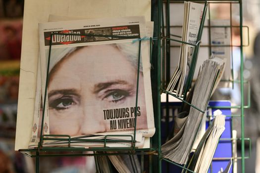 PARIS, FRANCE - APRIL 21, 2022 : Newspaper with a portrait of Marine Le Pen candidate for President elections 2022 in France