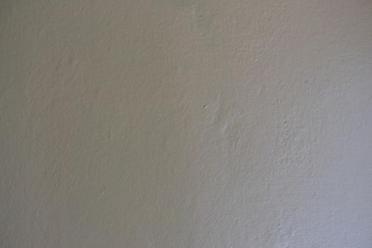 Gray yellow painted wall. Gradient background.
