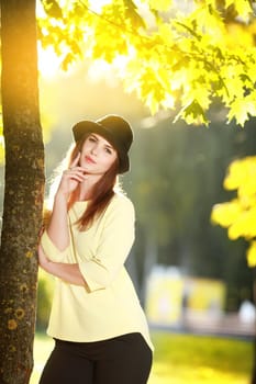 Portrait of beautiful young woman with sunny day