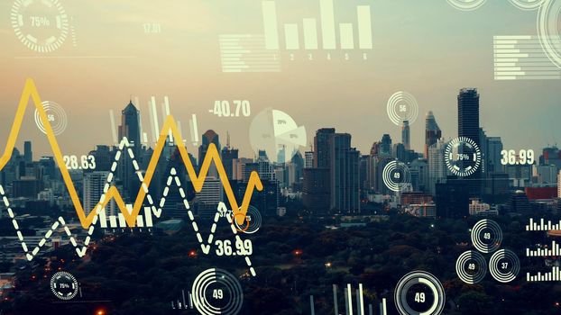 Business data analytic interface fly over smart city showing alteration future of business intelligence. Computer software and artificial intelligence are used to analyze big data for strategic plan .