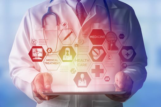 Medical Healthcare Concept - Doctor in hospital with medical icons modern interface showing symbol of medicine, innovation, medical treatment, emergency service, doctoral data and patient health.