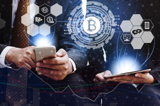 Bitcoin and cryptocurrency investing concept - Businessman using mobile phone application to trade Bitcoin BTC with another trader in modern graphic interface. Blockchain and financial technology.