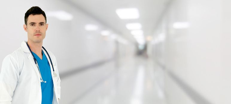 Young male doctor working at the hospital. Medical healthcare and doctor staff service.