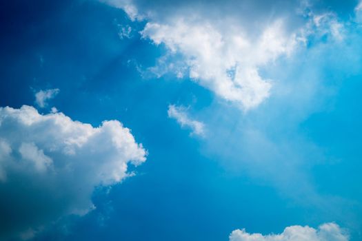 Sun shines throud white clouds