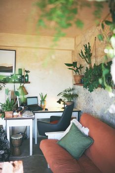 Still life shot of a workstation in the living room of a rustic apartment