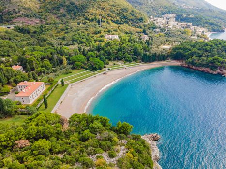 Queen's Beach in Milocer, Montenegro. Aerial view of sea waves and fantastic Rocky coast, Montenegro.