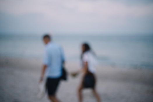 Couple at the seaside image blur romantic vintage style.