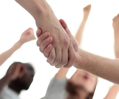 confident group of young men pointing ahead. photo with copy space