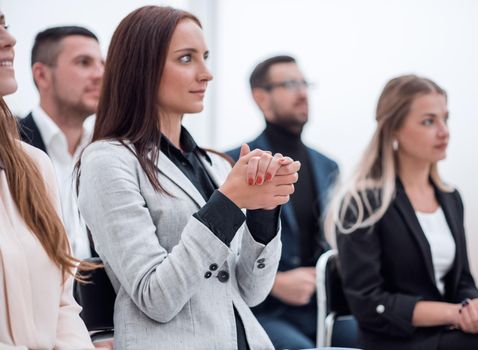 close up. audience applauds during a business seminar