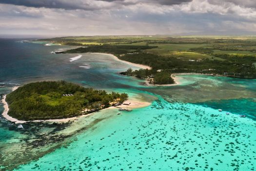 View from the height of the east coast of the island of Mauritius in the Indian Ocean. Beautiful lagoon of the island of Mauritius