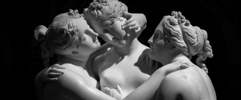 MILAN, ITALY - CIRCA JUNE 2020: Antonio Canova’s statue The Three Graces (Le tre Grazie). Neoclassical sculpture, in marble, of the mythological three charites (made in Rome, 1814-1817)